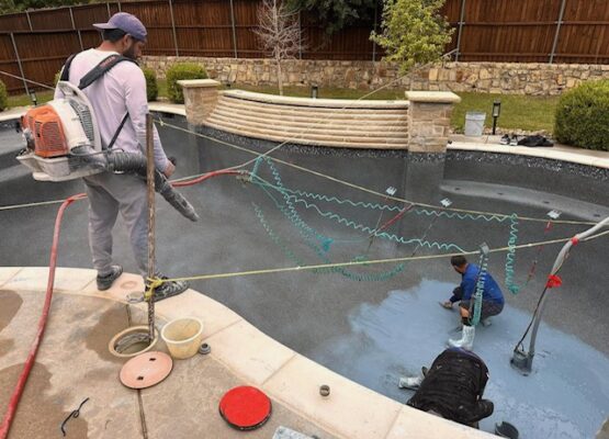 New Plaster Job In Progress Technicians performing pool resurfacing and leak testing